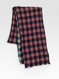 Soft, double-faced crinkle cotton offers two distinctive colorways to compliment your wardrobe.Fringed ends8W X 70LCottonImported Soft, double-faced crinkle cotton offers two distinctive colorways to compliment your wardrobe.Fringed ends8W X 70LCottonImported