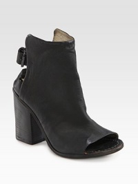 Modern, open-back design in soft leather, finished with a back buckle, stacked heel and peep toe. Stacked heel, 3½ (90mm)Leather upperLeather lining and solePadded insoleMade in Italy Modern, open-back design in soft leather, finished with a back buckle, stacked heel and peep toe. Stacked heel, 3½ (90mm)Leather upperLeather lining and solePadded insoleMade in Italy