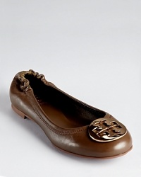 A Tory Burch classic--the must-have Reva flat reappears in buttery soft leather with a gleaming logo. A Tory Burch classic--the must-have Reva flat reappears in buttery soft leather with a gleaming logo.
