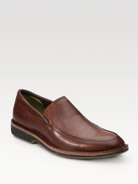 An elegant slip-on style is constructed in hand-painted leather with stitch-out detail and patented Nike technology for on-your-feet ease. Partial leather lining Padded insole Rubber sole Imported An elegant slip-on style is constructed in hand-painted leather with stitch-out detail and patented Nike technology for on-your-feet ease. Partial leather lining Padded insole Rubber sole Imported