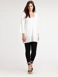 Treat yourself to a design that is part sophisticated and part sporty. Offering arm coverage and an impeccable fit, this hooded tunic is made from a luxurious blend of linen and cotton.Attached hoodThree-quarter sleevesPull-on styleRibbed trimSide slitsAbout 30 from shoulder to hem56% linen/44% cottonDry cleanImported Treat yourself to a design that is part sophisticated and part sporty. Offering arm coverage and an impeccable fit, this hooded tunic is made from a luxurious blend of linen and cotton.Attached hoodThree-quarter sleevesPull-on styleRibbed trimSide slitsAbout 30 from shoulder to hem56% linen/44% cottonDry cleanImported