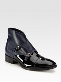 Adjustable leather buckle straps top this two-tone patent leather essential. Stacked heel, 1¼ (30mm)Leather and patent leather upperAdjustable buckle strapsLeather lining and solePadded insoleMade in Italy Adjustable leather buckle straps top this two-tone patent leather essential. Stacked heel, 1¼ (30mm)Leather and patent leather upperAdjustable buckle strapsLeather lining and solePadded insoleMade in Italy