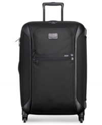 Full speed ahead! A marriage of innovative design & sleek style, this lightweight travel pro is crafted from a smart hybrid blend of flexible ballistic nylon & protective hardside material. An extra-large packing capacity coasts effortlessly on 360º spinners that are brilliantly guided by Tumi's patented impact-resistant X-Brace™ handle system, which stands up to the wear & tear of busy travel. Lifetime warranty. Full speed ahead! A marriage of innovative design & sleek style, this lightweight travel pro is crafted from a smart hybrid blend of flexible ballistic nylon & protective hardside material. An extra-large packing capacity coasts effortlessly on 360º spinners that are brilliantly guided by Tumi's patented impact-resistant X-Brace™ handle system, which stands up to the wear & tear of busy travel. Lifetime warranty.