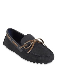 Combining the simplicity of a driving loafer with moccasin construction and classic boat shoe details, these shoes give you a wear-anytime option that pairs effortlessly with your casually refined wardrobe. Combining the simplicity of a driving loafer with moccasin construction and classic boat shoe details, these shoes give you a wear-anytime option that pairs effortlessly with your casually refined wardrobe.