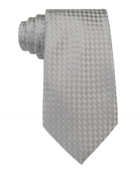 Earn your next tropical vacation in sleek style when you tie on this subtle refined print from Donald Trump. Earn your next tropical vacation in sleek style when you tie on this subtle refined print from Donald Trump.