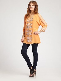 Bold embroidery on vibrant silk crepe-de-chine, styled in a chic open-shoulder tunic.V necklineOpen shouldersElbow sleevesV backAbout 31 from shoulder to hemSilkDry cleanImportedModel shown is 5'8½ (174cm) wearing US size Small. Bold embroidery on vibrant silk crepe-de-chine, styled in a chic open-shoulder tunic.V necklineOpen shouldersElbow sleevesV backAbout 31 from shoulder to hemSilkDry cleanImportedModel shown is 5'8½ (174cm) wearing US size Small.