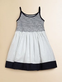 Crafted in plush cotton, this fancy frock's smocked bodice, full skirt and perky polka dots complete the look.Spaghetti strapsRound necklineButton backSmocked bodiceBack tie waistFull skirtFully linedCottonMachine wash coldImported Please note: Number of buttons may vary depending on size ordered. Crafted in plush cotton, this fancy frock's smocked bodice, full skirt and perky polka dots complete the look.Spaghetti strapsRound necklineButton backSmocked bodiceBack tie waistFull skirtFully linedCottonMachine wash coldImported Please note: Number of buttons may vary depending on size ordered.