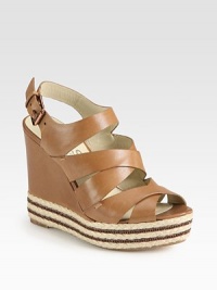 Wide leather slingback with cross-cross straps join a chain-embellished espadrille wedge. Leather, hemp and chain-covered wedge, 5 (125mm)Hemp and chain-covered platform, 2 (50mm)Compares to a 3 heel (75mm)Leather upperAdjustable ankle strapLeather liningBuffed leather solePadded insoleImported Wide leather slingback with cross-cross straps join a chain-embellished espadrille wedge. Leather, hemp and chain-covered wedge, 5 (125mm)Hemp and chain-covered platform, 2 (50mm)Compares to a 3 heel (75mm)Leather upperAdjustable ankle strapLeather liningBuffed leather solePadded insoleImported