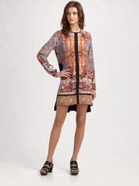 Translated in a bold, eclectic print, this modern silhouette has contrast trim and a hi-lo hem. RoundneckLong sleevesBack keyhole detail with button closureHi-lo hemAbout 17 from natural waist at shortest pointPolyesterDry cleanMade in USA of imported fabricModel shown is 5'10 (177cm) wearing US size Small. Translated in a bold, eclectic print, this modern silhouette has contrast trim and a hi-lo hem. RoundneckLong sleevesBack keyhole detail with button closureHi-lo hemAbout 17 from natural waist at shortest pointPolyesterDry cleanMade in USA of imported fabricModel shown is 5'10 (177cm) wearing US size Small.