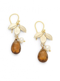 THE LOOKFaceted honey quartz detailsLeaf and small white round pearl accents18k yellow goldplated brassEar wireTHE MEASUREMENTLength, about 1ORIGINMade in USA THE LOOKFaceted honey quartz detailsLeaf and small white round pearl accents18k yellow goldplated brassEar wireTHE MEASUREMENTLength, about 1ORIGINMade in USA