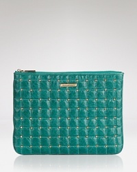 Pouch your bets with this Rebecca Minkoff piece, crafted of leather and splashed in oh so edgy studs. Pouch your bets with this Rebecca Minkoff piece, crafted of leather and splashed in oh so edgy studs.