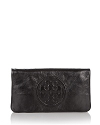 Tory Burch's iconic Reva clutch in luxurious bombe leather.