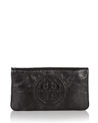 Tory Burch's iconic Reva clutch in luxurious bombe leather. Tory Burch's iconic Reva clutch in luxurious bombe leather.