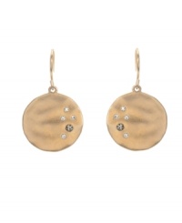 Get stellar style with a hint of sparkle. Kenneth Cole New York earrings feature a circular drop accented by round-cut crystals. Set in worn gold tone mixed metal. Approximate drop: 1-1/4 inches. Get stellar style with a hint of sparkle. Kenneth Cole New York earrings feature a circular drop accented by round-cut crystals. Set in worn gold tone mixed metal. Approximate drop: 1-1/4 inches.