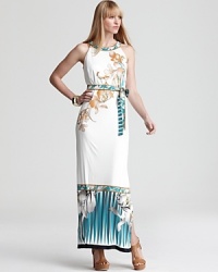 Graphic stripes offer an edgy counterpoint to ornate florals for a thoroughly modern take on the Elie Tahari maxi dress. Graphic stripes offer an edgy counterpoint to ornate florals for a thoroughly modern take on the Elie Tahari maxi dress.