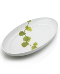 Forever spring. Bright new leaves plucked just for your table drape this oval serving platter for a fresh, modern look. From Mikasa dinnerware, the dishes of this Daylight set are durable and stylish in white porcelain with a uniquely sloped rim and raised interior.