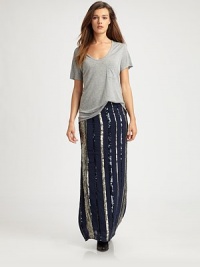 Shimmering sequins form contrasting stripes on this silken maxi skirt. Side zipperFully linedAbout 43 longSequined silkDry cleanImportedModel shown is 5'10 (177cm) wearing US size Small. Shimmering sequins form contrasting stripes on this silken maxi skirt. Side zipperFully linedAbout 43 longSequined silkDry cleanImportedModel shown is 5'10 (177cm) wearing US size Small.