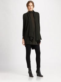 Offering the best of both worlds, this sweater is lightweight and cozy.Draped frontThree-quarter sleevesAllover ribbingHi-lo hemAbout 32 from shoulder to hemWoolDry cleanMade in Italy Model shown is 5'11 (180cm) wearing US size Small. Offering the best of both worlds, this sweater is lightweight and cozy.Draped frontThree-quarter sleevesAllover ribbingHi-lo hemAbout 32 from shoulder to hemWoolDry cleanMade in Italy Model shown is 5'11 (180cm) wearing US size Small.