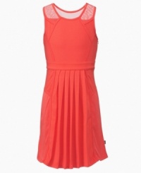 Hot style with a cool design, sheer mesh overlays on the shoulders of this DKNY dress add a unique twist. Hot style with a cool design, sheer mesh overlays on the shoulders of this DKNY dress add a unique twist.