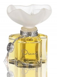 Oscar de la Renta once dreamed of creating a perfume that in one drop captured all of the joy and sophistication of his designs. As a child, Oscar imagined that the fragrance of a flower could be caught in a drop of morning dew. He designed the Oscar bottle to symbolize this precious essence of flowers. Made in France. .25 oz. 