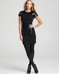 MICHAEL Michael Kors infuses an easy shift dress with gleaming sequin embellishment and exposed zipper detailing for a festive frock that works day and night. MICHAEL Michael Kors infuses an easy shift dress with gleaming sequin embellishment and exposed zipper detailing for a festive frock that works day and night.