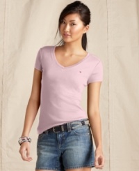 Keep it casual in this essential V-neck from Tommy Hilfiger. The slim fit makes it an all-season must-have that layers fantastically! Keep it casual in this essential V-neck from Tommy Hilfiger. The slim fit makes it an all-season must-have that layers fantastically!
