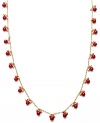 Dot your neck with cute coral. Lauren by Ralph Lauren's mixed metal chain necklace is accented with reconstituted coral beads. Approximate length: 36 inches. Dot your neck with cute coral. Lauren by Ralph Lauren's mixed metal chain necklace is accented with reconstituted coral beads. Approximate length: 36 inches.