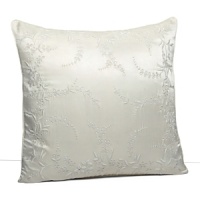 This luxurious all-white bedding ensemble incorporates couture-inspired details - from intricate floral embroidery to elegant silk matelasse - for a feminine vision of modern romance. This luxurious all-white bedding ensemble incorporates couture-inspired details - from intricate floral embroidery to elegant silk matelasse - for a feminine vision of modern romance.