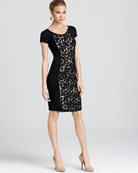 Lace brings a touch of drama to this sophisticated Moschino Cheap and Chic short sleeve dress in plush wool. Lace brings a touch of drama to this sophisticated Moschino Cheap and Chic short sleeve dress in plush wool.