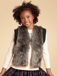With a lush faux-fur front and a chunky knit back, this textural vest is a just-right blend of cozy and chic.Open front with button closureSleeveless with ribbed trimCotton liningFaux-fur front: 67% acrylic/17% modacrylic/16%polyesterSweater back: 63% acrylic/20% polyester/17% modacrylicDry cleanImported With a lush faux-fur front and a chunky knit back, this textural vest is a just-right blend of cozy and chic.Open front with button closureSleeveless with ribbed trimCotton liningFaux-fur front: 67% acrylic/17% modacrylic/16%polyesterSweater back: 63% acrylic/20% polyester/17% modacrylicDry cleanImported