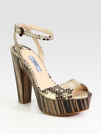 Python adjustable ankle strap style with a wood platform and heel. Wooden heel, 5 (125mm)Wooden platform, 1 (25mm)Compares to a 4 heel (100mm)Python upperLeather lining and solePadded insoleMade in ItalyOUR FIT MODEL RECOMMENDS ordering one half size up as this style runs small. Python adjustable ankle strap style with a wood platform and heel. Wooden heel, 5 (125mm)Wooden platform, 1 (25mm)Compares to a 4 heel (100mm)Python upperLeather lining and solePadded insoleMade in ItalyOUR FIT MODEL RECOMMENDS ordering one half size up as this style runs small.