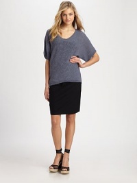 The right knit with the right fit, courtesy of feminine dolman sleeves and a flattering, curved hem.V-neckDolman sleevesRibbed trimAbout 24 from shoulder to hem45% linen/29% cotton/14% nylon/ 12% rayonDry cleanImported Model shown is 5'10 (177cm) wearing US size Small. The right knit with the right fit, courtesy of feminine dolman sleeves and a flattering, curved hem.V-neckDolman sleevesRibbed trimAbout 24 from shoulder to hem45% linen/29% cotton/14% nylon/ 12% rayonDry cleanImported Model shown is 5'10 (177cm) wearing US size Small.