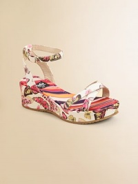 Positively brilliant, this graceful sandal combines bright butterflies and colorful stripes on a modern wedge.Polyester fabric upperCrisscross front strapsBuckle ankle strapsGoatskin leather liningStriped fabric footbedMolded fabric-covered wedgeNon-slip soleMade in Italy Positively brilliant, this graceful sandal combines bright butterflies and colorful stripes on a modern wedge.Polyester fabric upperCrisscross front strapsBuckle ankle strapsGoatskin leather liningStriped fabric footbedMolded fabric-covered wedgeNon-slip soleMade in Italy