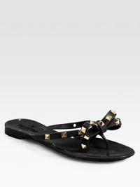 Low-cut silhouette sprinkled in edgy studs, topped with a signature bow. Studded PVC upperPVC lining and solePadded insoleMade in ItalyOUR FIT MODEL RECOMMENDS ordering one half size down as this style runs large. Low-cut silhouette sprinkled in edgy studs, topped with a signature bow. Studded PVC upperPVC lining and solePadded insoleMade in ItalyOUR FIT MODEL RECOMMENDS ordering one half size down as this style runs large.