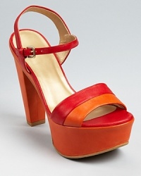 In fiery hues, Stuart Weitzman's Once platforms boast a playfully curvy silhouette with subtle retro charm. In fiery hues, Stuart Weitzman's Once platforms boast a playfully curvy silhouette with subtle retro charm.