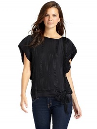 THE LOOKAbstract brush stroke printPullover styleRound necklineShort dolman sleevesCascading fringe and bead detailsBanded hem with side tieTHE FITAbout 25 from shoulder to hemTHE MATERIALSilkCARE & ORIGINDry cleanImported THE LOOKAbstract brush stroke printPullover styleRound necklineShort dolman sleevesCascading fringe and bead detailsBanded hem with side tieTHE FITAbout 25 from shoulder to hemTHE MATERIALSilkCARE & ORIGINDry cleanImported