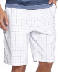 Subtle plaid on crisp white, these golf shorts from Champions Tour are perfect for long rounds with buddies. Subtle plaid on crisp white, these golf shorts from Champions Tour are perfect for long rounds with buddies.