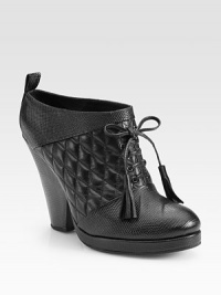 Quilted, tastefully textured leather with tassel laces and a chunky heel. Embossed leather heel, 4½ (115mm)Covered platform, ½ (15mm)Compares to a 4 heel (100mm)Leather upperLeather liningBuffed leather soleImportedOUR FIT MODEL RECOMMENDS ordering true size. Quilted, tastefully textured leather with tassel laces and a chunky heel. Embossed leather heel, 4½ (115mm)Covered platform, ½ (15mm)Compares to a 4 heel (100mm)Leather upperLeather liningBuffed leather soleImportedOUR FIT MODEL RECOMMENDS ordering true size.