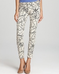 Imbued with a graphic leaf print, these Paige Denim skinny jeans punctuate every look with earthy chic. Imbued with a graphic leaf print, these Paige Denim skinny jeans punctuate every look with earthy chic.