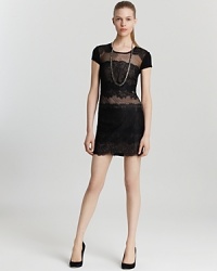 Lend drama to date night in a daring BCBGMAXAZRIA dress with sheer black cut-outs over a visible nude lining. The body-con look flaunts your curves; you flaunt your impeccable sense of style. Lend drama to date night in a daring BCBGMAXAZRIA dress with sheer black cut-outs over a visible nude lining. The body-con look flaunts your curves; you flaunt your impeccable sense of style.