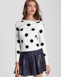Polka dots aplenty are accented with black rhinestones in this playful essential from Alice + Olivia. Polka dots aplenty are accented with black rhinestones in this playful essential from Alice + Olivia.