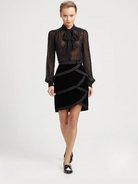 This airy, sheer silhouette is tailored with a soft tie neckline, and dotted with a velvet polka-dot pattern.Tie necklineYoke gathersButton frontLong sleeves with button cuffsAbout 25 from shoulder to hem60% silk/40% viscoseDry cleanMade in Italy of imported fabricModel shown is 5'9 (175cm) wearing US size 4. This airy, sheer silhouette is tailored with a soft tie neckline, and dotted with a velvet polka-dot pattern.Tie necklineYoke gathersButton frontLong sleeves with button cuffsAbout 25 from shoulder to hem60% silk/40% viscoseDry cleanMade in Italy of imported fabricModel shown is 5'9 (175cm) wearing US size 4.