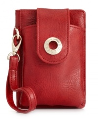 The chicest way to tote your necessities. This sleek wristlet design from Kenneth Cole Reaction features a fashionable way to store your phone, card and cash. The chicest way to tote your necessities. This sleek wristlet design from Kenneth Cole Reaction features a fashionable way to store your phone, card and cash.
