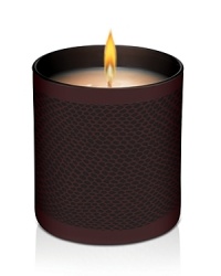 Set the holiday mood with Laura Mercier's limited-edition Signature Candles. In 7.5 oz. chocolate brown glass tumblers, each candle features Laura's signature style with a tone-on-tone snakeskin inspired deco. Laura Mercier Warm Roasted Chestnuts Signature Candle treats your senses to a decadent delight with Laura's signature scent this holiday season. The heavenly aroma of roasted chestnuts, nutmeg, spicy berry, clove and warm vanilla sugar drifts through any space to create a warm, welcoming ambience. Burn time: 55 hours.