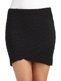 THE LOOKAllover asymmetric ruchingAsymmetric hemBack zip with hook-and-eye closureTHE FITAbout 16 from waist to hemTHE MATERIALRayon/spandexCARE & ORIGINDry cleanMade in USAModel shown is 5'8 (172½cm) wearing US size Small. THE LOOKAllover asymmetric ruchingAsymmetric hemBack zip with hook-and-eye closureTHE FITAbout 16 from waist to hemTHE MATERIALRayon/spandexCARE & ORIGINDry cleanMade in USAModel shown is 5'8 (172½cm) wearing US size Small.