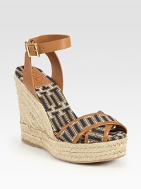 Uptown-chic espadrille silhouette has an adjustable leather ankle strap and soft straps in a modern geometric pattern. Braided hemp wedge, 5 (125mm)Braided hemp platform, 1 (25mm)Compares to a 4 heel (100mm)Leather and fabric upperRubber solePadded insoleImportedOUR FIT MODEL RECOMMENDS ordering true whole size; ½ sizes should order the next whole size up. Uptown-chic espadrille silhouette has an adjustable leather ankle strap and soft straps in a modern geometric pattern. Braided hemp wedge, 5 (125mm)Braided hemp platform, 1 (25mm)Compares to a 4 heel (100mm)Leather and fabric upperRubber solePadded insoleImportedOUR FIT MODEL RECOMMENDS ordering true whole size; ½ sizes should order the next whole size up.