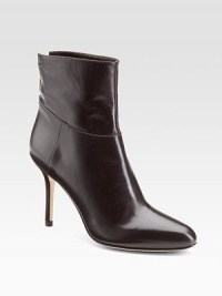 From the 24:7 collection. Modern leather bootie shaped to a point toe with seam detail for added definition.Self-covered heel, 3½ Shaft, 4½ Leg circumference, 9½ Point toe Three-quarter back zip Leather lining and sole Made in ItalyOUR FIT MODEL RECOMMENDS ordering one half size up as this style runs small. From the 24:7 collection. Modern leather bootie shaped to a point toe with seam detail for added definition.Self-covered heel, 3½ Shaft, 4½ Leg circumference, 9½ Point toe Three-quarter back zip Leather lining and sole Made in ItalyOUR FIT MODEL RECOMMENDS ordering one half size up as this style runs small.