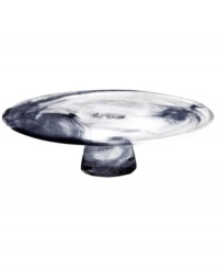 With wisps of smoky black in Kosta Boda glass, the Mine cake stand presents sweet treats with eye-catching artistry. Designed by Ulrika Hydman-Vallien. With wisps of smoky black in Kosta Boda glass, the Mine cake stand presents sweet treats with eye-catching artistry. Designed by Ulrika Hydman-Vallien.