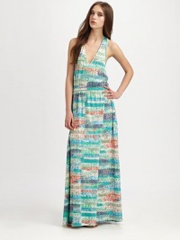 Abstract print adds vibrancy to this lengthy drop-waist design with a faux-wrap skirt, while an unexpected racerback adds a dose of sporty-chic. V-neckSleevelessElasticized drop waistFaux wrap skirtRacerbackAbout 39 from natural waist55% cotton/45% modalHand washImportedModel shown is 5'10 (177cm) wearing US size Small. Abstract print adds vibrancy to this lengthy drop-waist design with a faux-wrap skirt, while an unexpected racerback adds a dose of sporty-chic. V-neckSleevelessElasticized drop waistFaux wrap skirtRacerbackAbout 39 from natural waist55% cotton/45% modalHand washImportedModel shown is 5'10 (177cm) wearing US size Small.