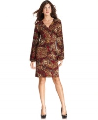 Wild one: Jones New York Signature's long-sleeve dress features a faux-wrap silhouette and a bold print for a flattering look you'll love. (Clearance)